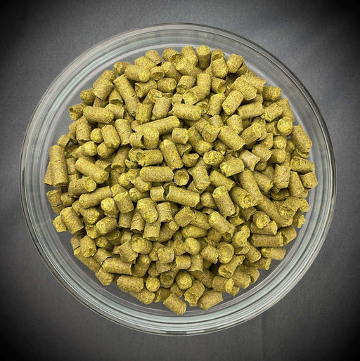 A bowl of Cryo® Mosaic® Hops Pellets Hops, showcasing their form, perfect for brewing.