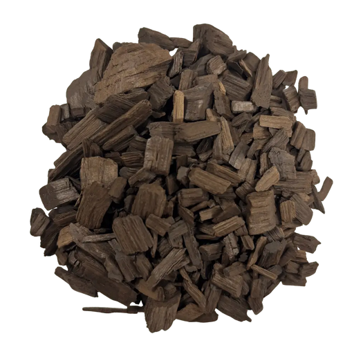 A pile of heavy toasted French White Oak chips used for flavoring wine and mead