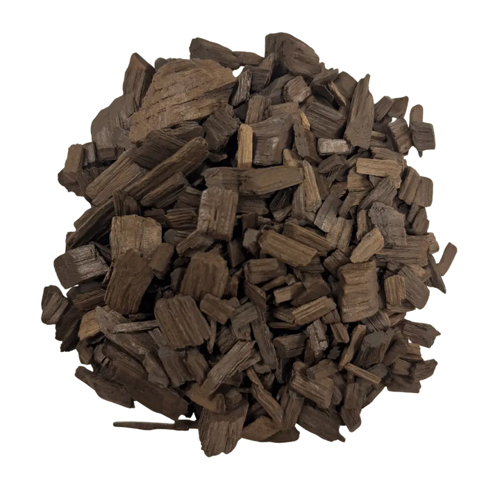 A pile of heavy toasted French White Oak chips used for flavoring wine and mead