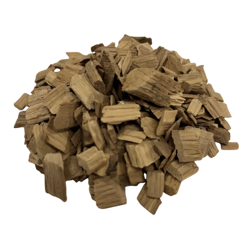 A pile of light toasted American Oak chips used for flavoring wine and mead, angled view