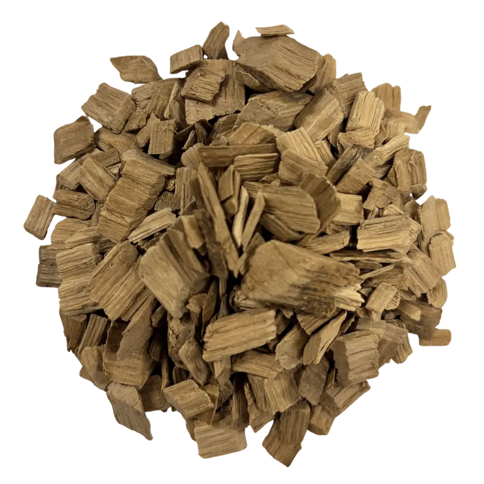 A pile of light toasted French White Oak chips used for flavoring wine and mead