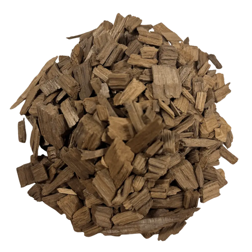 A pile of medium toasted French Oak chips used for flavoring wine and mead