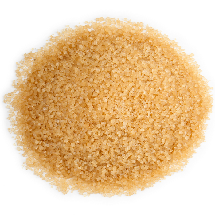 Coarse golden-brown Demerara sugar crystals for brewing