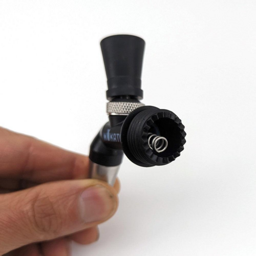 Image of the NukaTap Mini Faucet self closing spring, installed into the rear of a NukaTap Mini Faucet.
