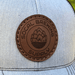 Gray cap with a brown leather patch featuring 'SOCAL BREWING SUPPLY' branding.